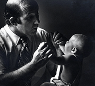 Dr Greenspan with a child